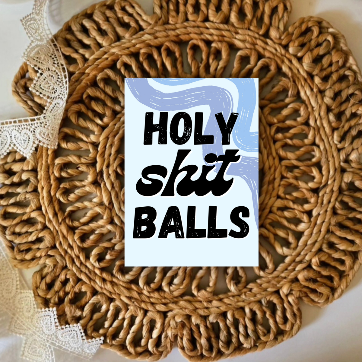 Rattan placemat with a graphic design featuring text on a white background