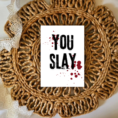 Round woven mat with 'YOU SLAY' text card on a white background