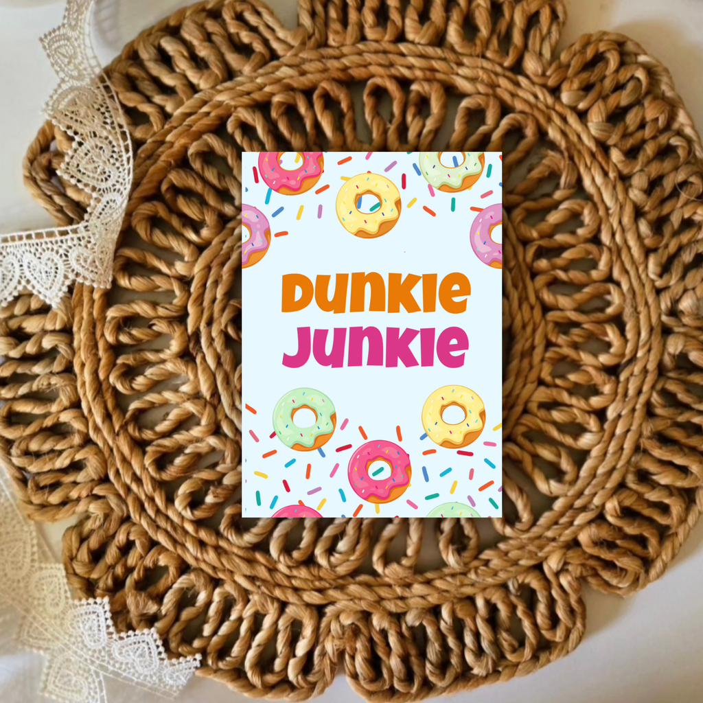 Woven placemat with a colorful 'Dunkie Junkie' sign featuring donut graphics.
