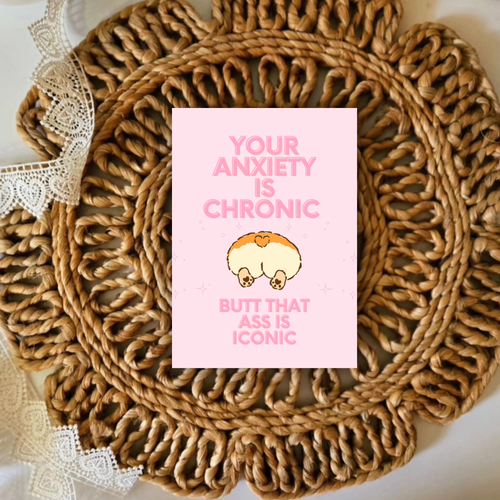 Round woven mat with a pink card featuring humorous text on a white background